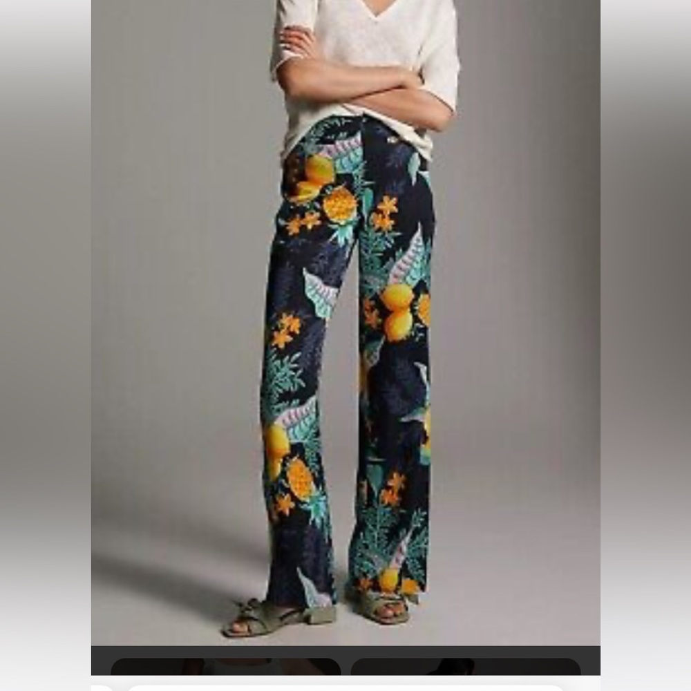 Anthropologie satin vacation pants. Tropical themed with lemons and pineapples.